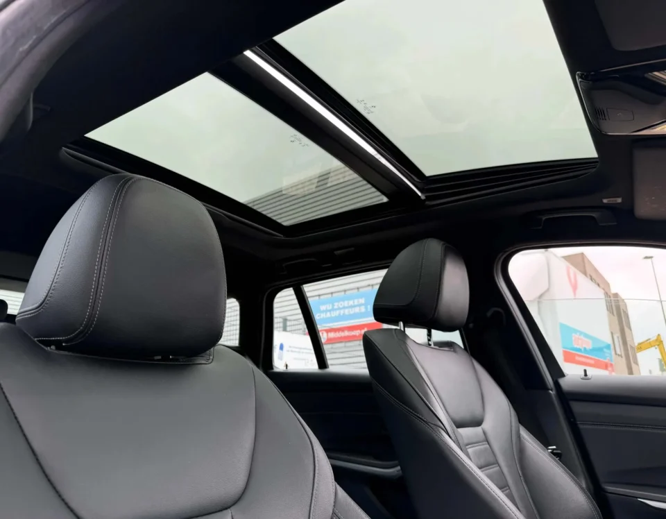 BMW 3-Serie Touring 330e High Executive M-Pakket 2021 panorama schuifdak bovenaanzicht