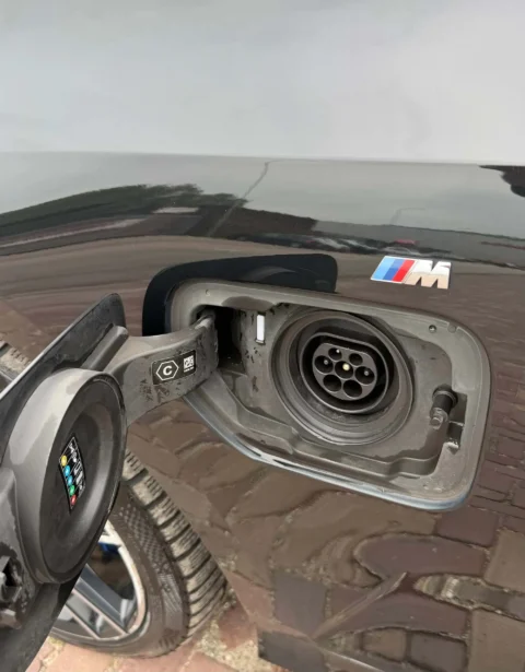 BMW 3-Serie Touring 330e High Executive M-Pakket 2021 oplaadsteker input voor elektrische hybride